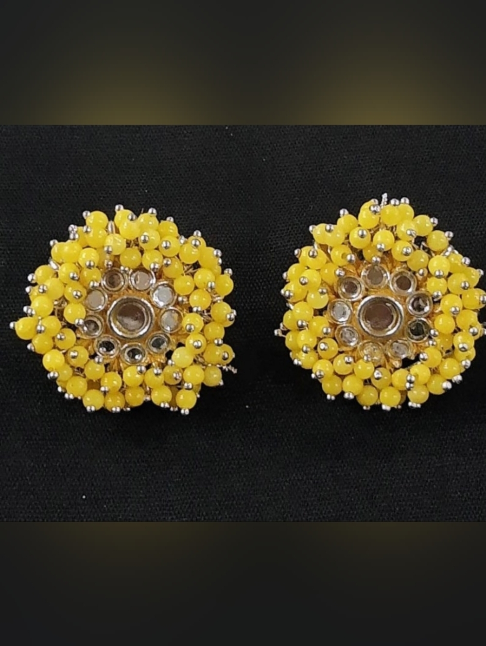 Ethnicyellow pearl studs crafted with ad stones